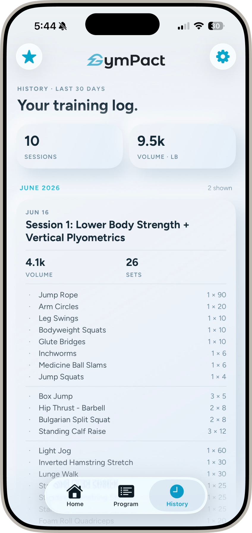 GymPact history screen showing a training log with sessions, total volume, and completed exercises